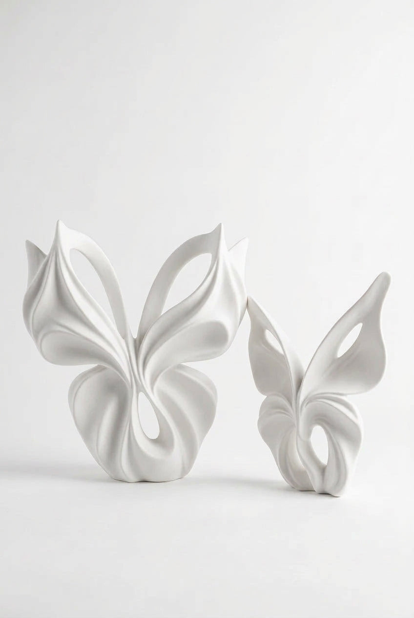 Duo de Sculptures Décoratives Ivoire – L’art des courbes