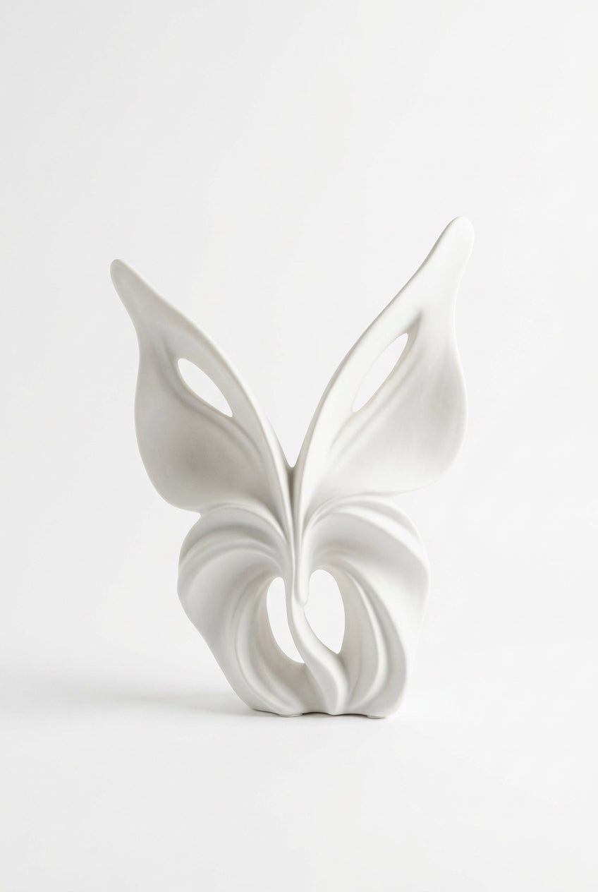 Duo de Sculptures Décoratives Ivoire – L’art des courbes