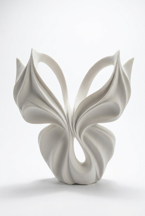 Duo de Sculptures Décoratives Ivoire – L’art des courbes